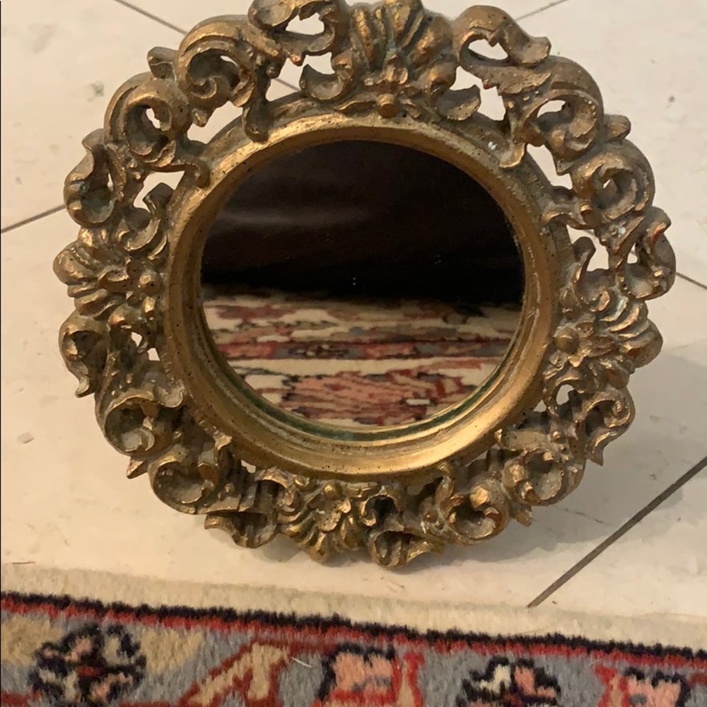 Small gold mirror